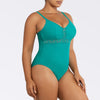 Dark mint Brigitte V-neck one-piece swimsuit by Parfait Lingerie with lace detail, shelf bra, and full coverage, shown from side.