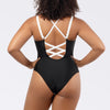 Black Lauren wireless bikini top with shelf bra and deep U-back, featuring white accents, by Parfait Lingerie.